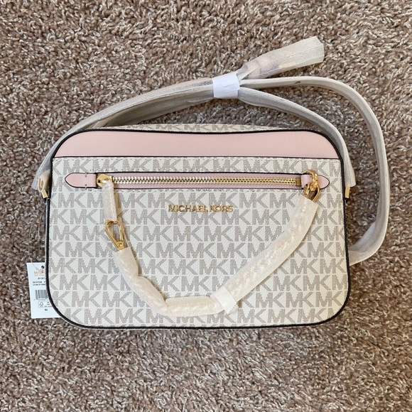 Michael Kors Handbags - SOLD ✨ Michael Kors Jet Set Logo Crossbody Purse
